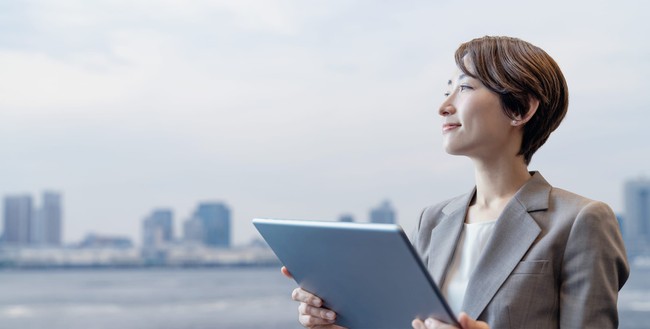 Businesswoman holding a tablet PC.